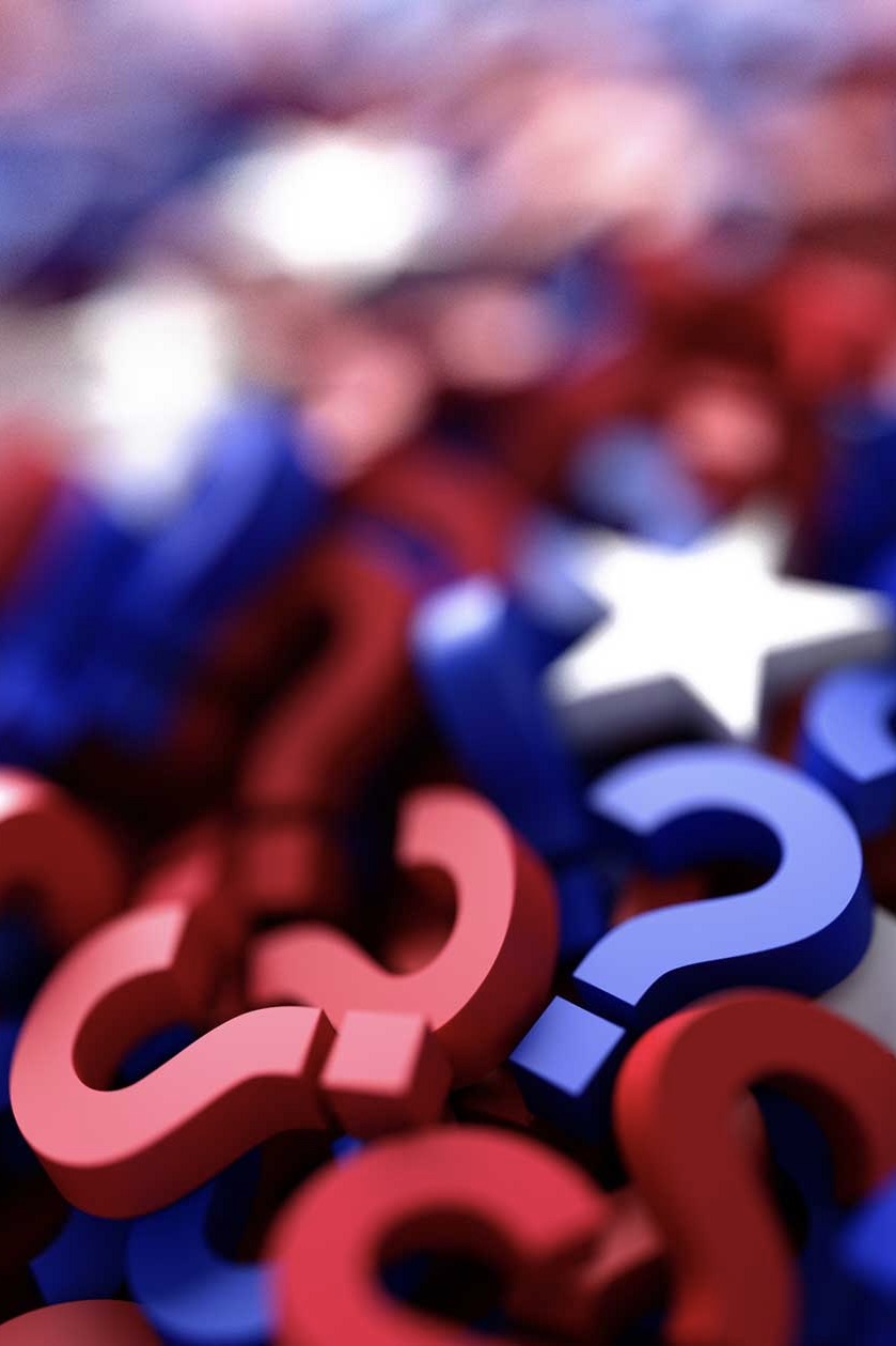 A pile of red and blue question marks and white stars