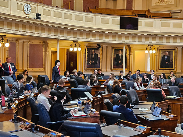 Students sit in the Virginia State Capitol chambers